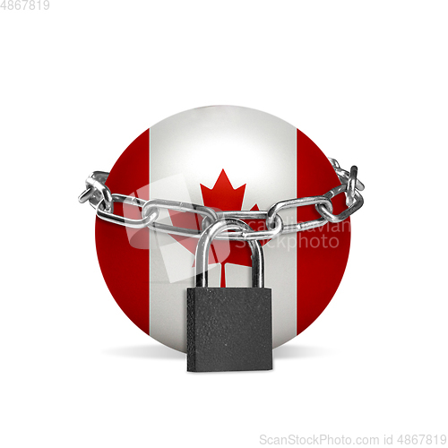 Image of Planet colored in Canada flag, locking with chain. Countries lockdown during coronavirus, COVID spreading