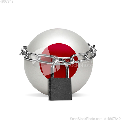 Image of Planet colored in Japan flag, locking with chain. Countries lockdown during coronavirus, COVID spreading