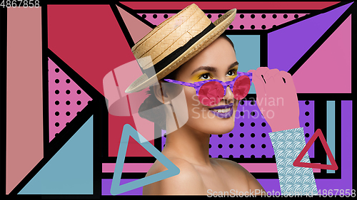 Image of Portrait of a beautiful young woman with bright colorful painted design