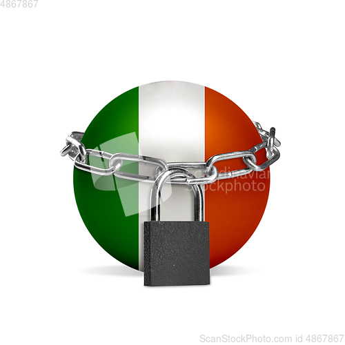 Image of Planet colored in Ireland flag, locking with chain. Countries lockdown during coronavirus, COVID spreading