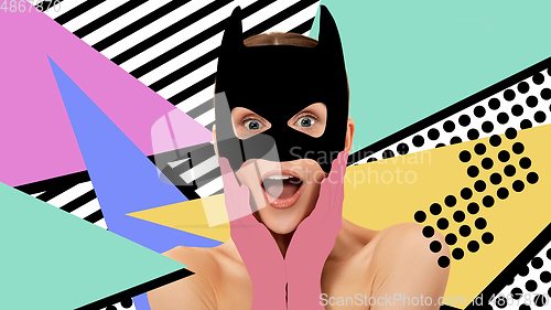 Image of Portrait of a beautiful young woman with bright colorful painted design