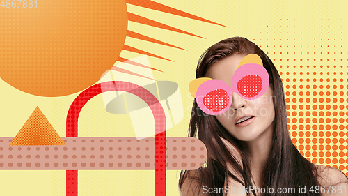 Image of Portrait of a beautiful young woman with bright colorful painted design