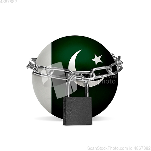 Image of Planet colored in Pakistan flag, locking with chain. Countries lockdown during coronavirus, COVID spreading