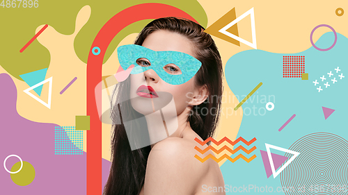 Image of Portrait of a beautiful young woman with bright colorful painted design