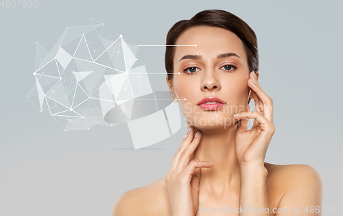 Image of young woman face with low poly shape projection