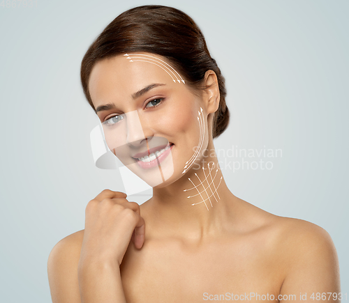 Image of beautiful young woman face with massage lines