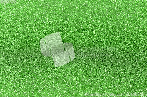 Image of green glitters or sequins background