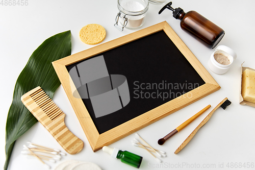 Image of natural cosmetics and chalkboard