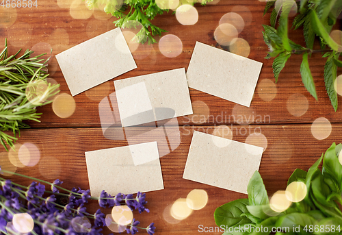 Image of greens, spices or medicinal herbs on wood