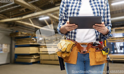 Image of woman or worker with tablet pc and working tools