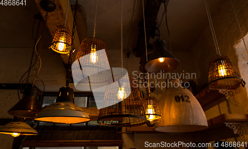 Image of lantern lamps hanging at restaurant