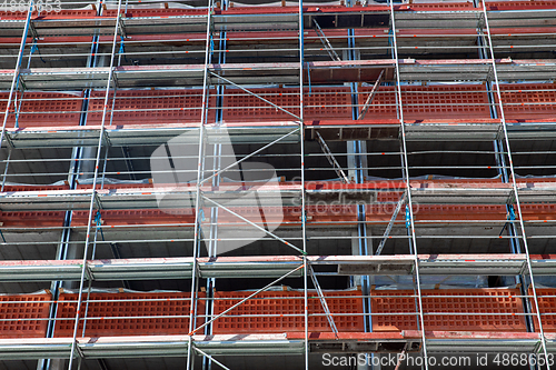 Image of building under construction with scaffolding