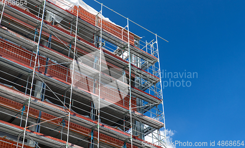 Image of building under construction with scaffolding