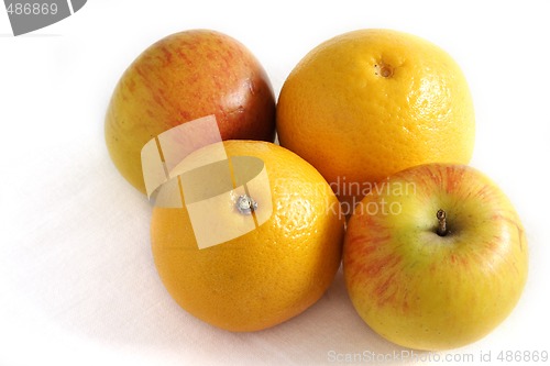 Image of four apples and oranges