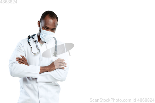 Image of Male young doctor with stethoscope and face mask isolated on white studio background