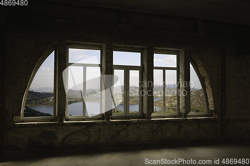 Image of Closed window and beautiful picture outside, nature view, resort and resting