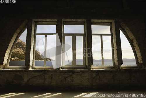 Image of Closed window and beautiful picture outside, nature view, resort and resting