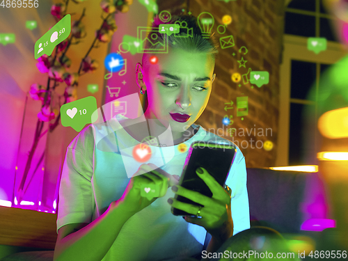 Image of Woman using interface modern technology and digital layer effect for social media displaying