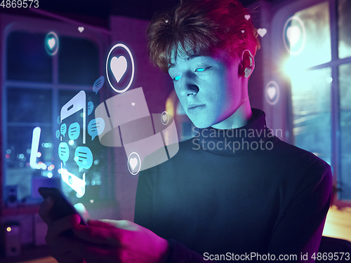 Image of Man using interface modern technology and digital layer effect for social media displaying