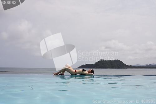 Image of woman enjoying the paradise 