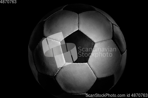 Image of Professional sport equipment isolated on black studio background. Soccer ball.