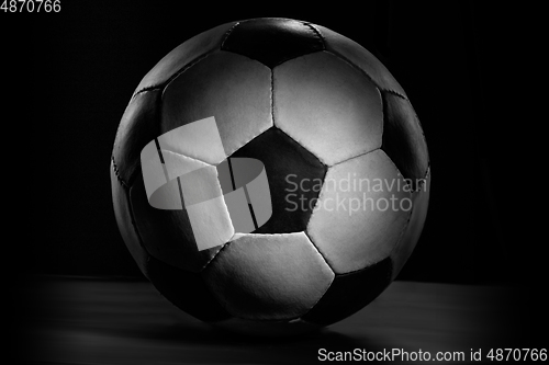 Image of Professional sport equipment isolated on black studio background. Soccer ball.