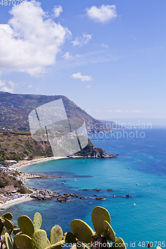 Image of View of turquoise gulf bay, sandy beach, green mountains and pla