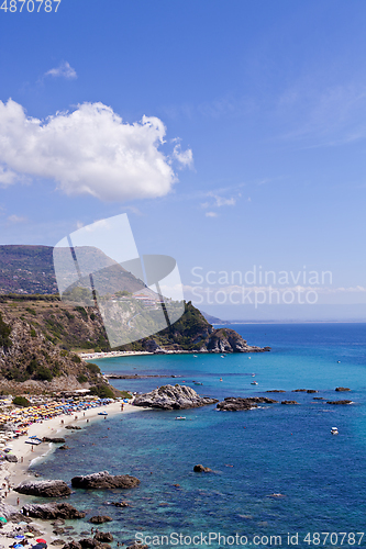 Image of View of turquoise gulf bay, sandy beach, green mountains and pla