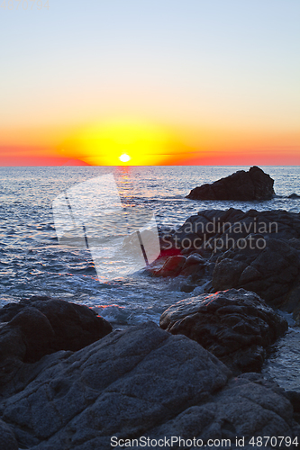 Image of Sunset on the rocky shore. Tyrrhenian Sea.