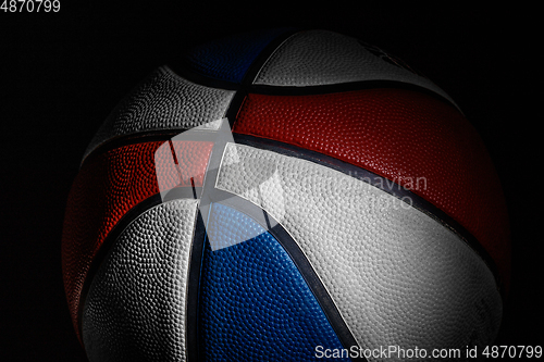 Image of Professional sport equipment isolated on black studio background. Basketball ball.