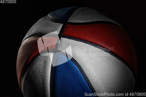 Image of Professional sport equipment isolated on black studio background. Basketball ball.