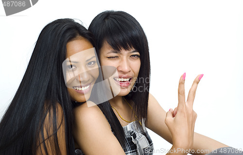 Image of two young asian girls