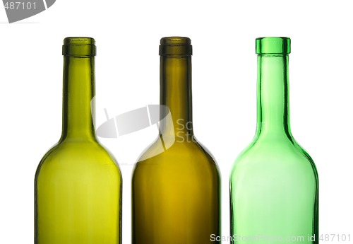 Image of Three green empty wine bottles