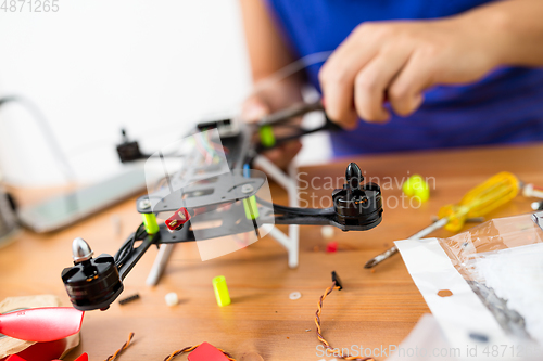 Image of Connecting the component on flying drone 