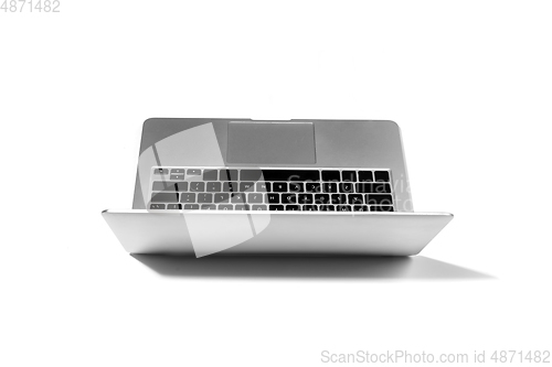 Image of Opened laptop isolated on white studio background with copyspace