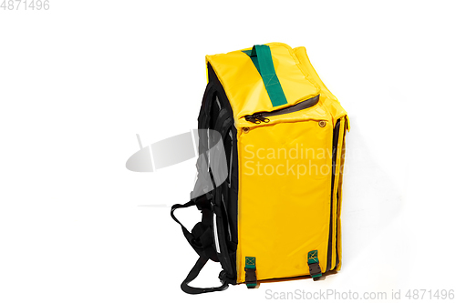 Image of Thermal yellow bag isolated on white studio background with copyspace. For food transportation and delivery service.