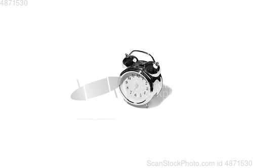 Image of Alarm clock isolated on white studio background with copyspace