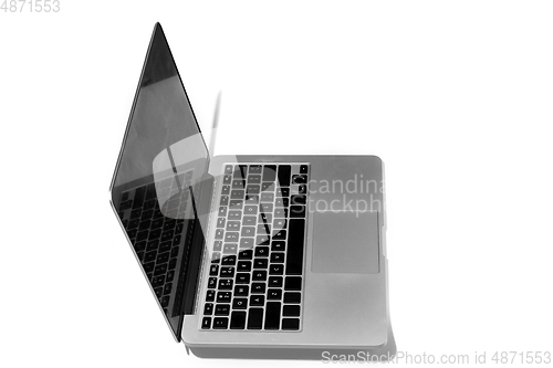 Image of Opened laptop isolated on white studio background with copyspace