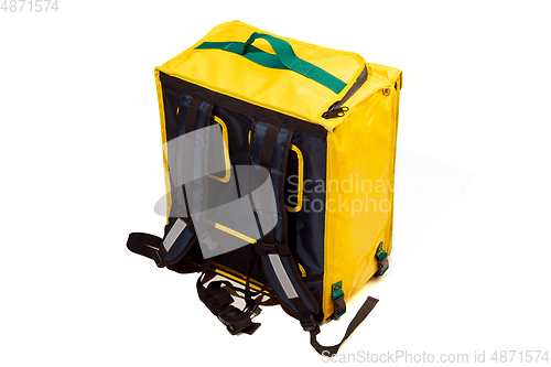 Image of Thermal yellow bag isolated on white studio background with copyspace. For food transportation and delivery service.