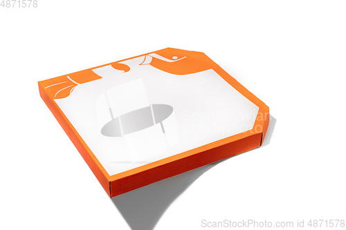Image of Close up of carton orange box for pizza isolated on white studio background with copyspace