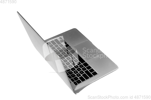 Image of Opened laptop isolated on white studio background with copyspace