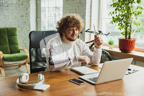 Image of Manager or student working from home while being insulated or keep quarantine \'cause of coronavirus COVID-19. Online meeting.