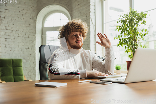 Image of Manager or student working from home while being insulated or keep quarantine \'cause of coronavirus COVID-19. Online conference, meeting.