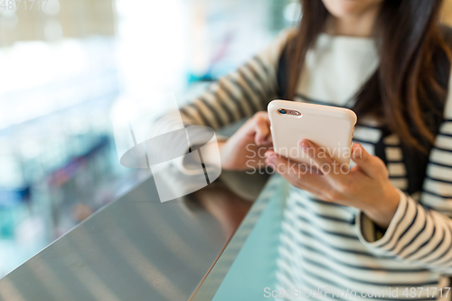 Image of Woman use of mobile phone