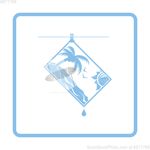 Image of Icon of photograph drying on rope