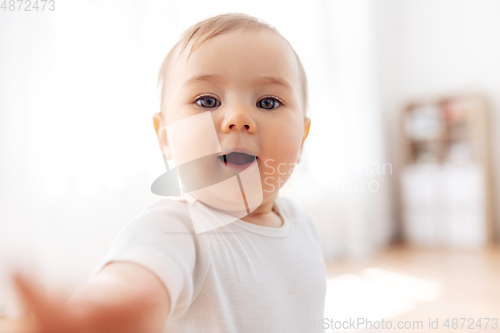 Image of portrait or selfie of little baby at home