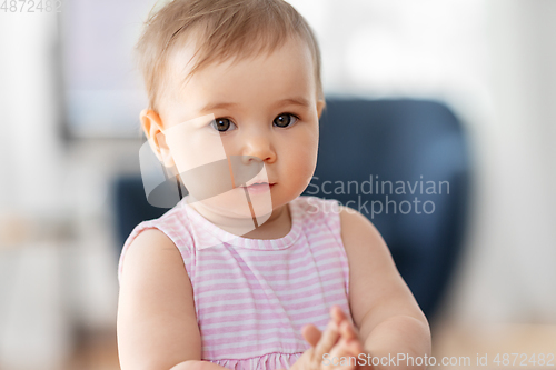 Image of portrait of little baby girl at home