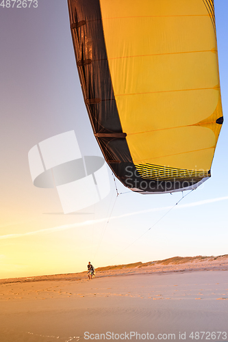 Image of Kite surfer watching the waves