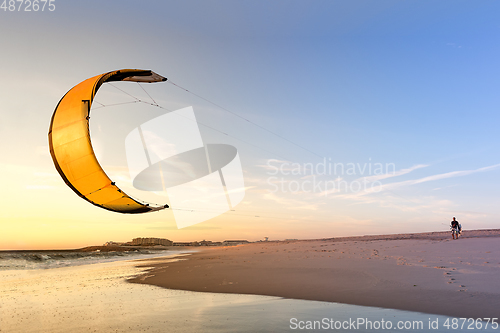 Image of Kite surfer watching the waves