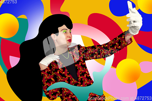 Image of Portrait of a young woman with freaky appearance, look and bright colorful painted design